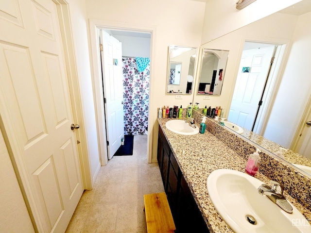 bathroom with vanity and tile patterned floors