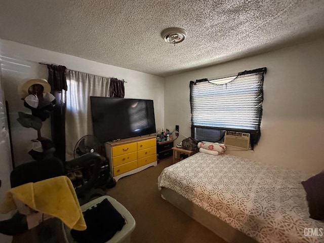 bedroom with cooling unit and a textured ceiling