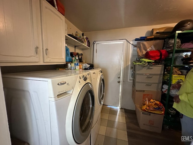 laundry room with cabinets and washing machine and dryer