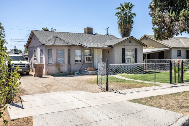 bungalow featuring a front yard