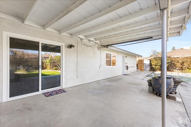 view of patio with fence