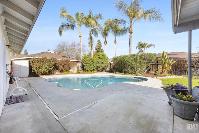 view of pool with a patio, a fenced backyard, and a fenced in pool