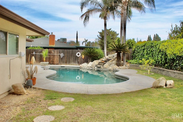 6813 Melones Ct, Bakersfield, CA 93309 - view of pool with a fenced backyard, a yard, and a fenced in pool