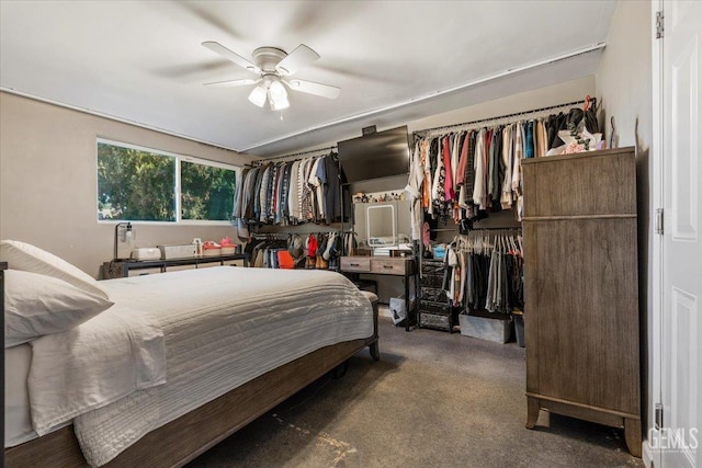 bedroom featuring ceiling fan and carpet floors