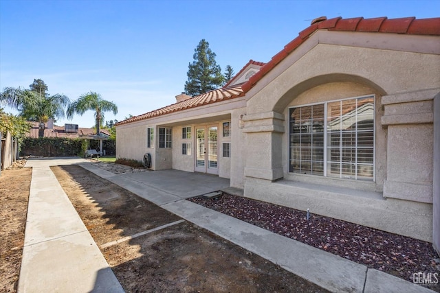 exterior space with french doors and a patio