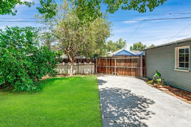 120 Pacific St, Bakersfield, CA 93305 - view of yard with a patio