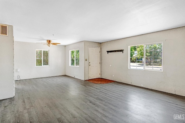 120 Pacific St, Bakersfield, CA 93305 - unfurnished living room featuring wood finished floors and ceiling fan