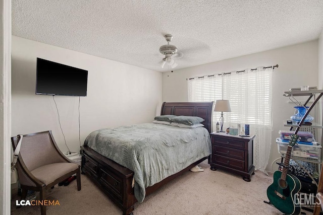 1800 Weyburn Way, Bakersfield, CA 93309 - bedroom featuring light colored carpet, a textured ceiling, and a ceiling fan