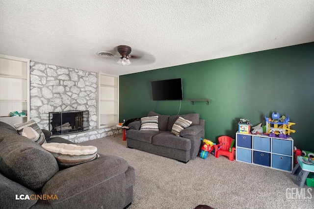 1800 Weyburn Way, Bakersfield, CA 93309 - carpeted living area with ceiling fan, a textured ceiling, a fireplace, and built in features