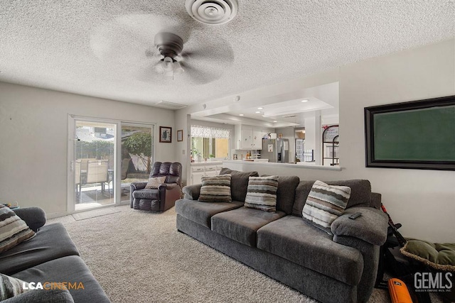 1800 Weyburn Way, Bakersfield, CA 93309 - living area featuring carpet flooring, ceiling fan, and a textured ceiling