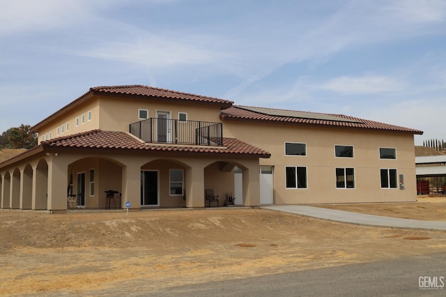 exterior space featuring a balcony