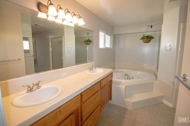 bathroom with tile patterned flooring, shower with separate bathtub, and vanity