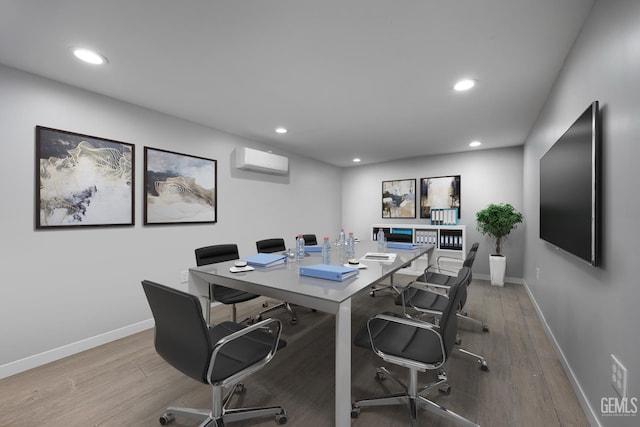 214 Driver Rd, Bakersfield, CA 93314 - home office with a wall unit AC, baseboards, recessed lighting, and wood finished floors