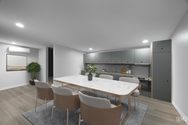 214 Driver Rd, Bakersfield, CA 93314 - dining area with light wood-type flooring, baseboards, recessed lighting, and a wall mounted AC