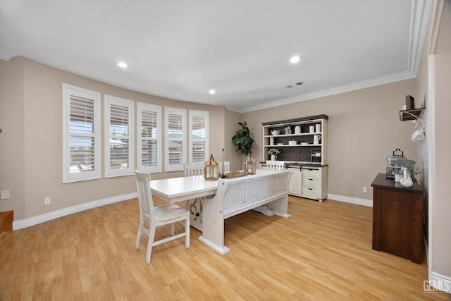 214 Driver Rd, Bakersfield, CA 93314 - dining room featuring light wood finished floors, crown molding, recessed lighting, and baseboards