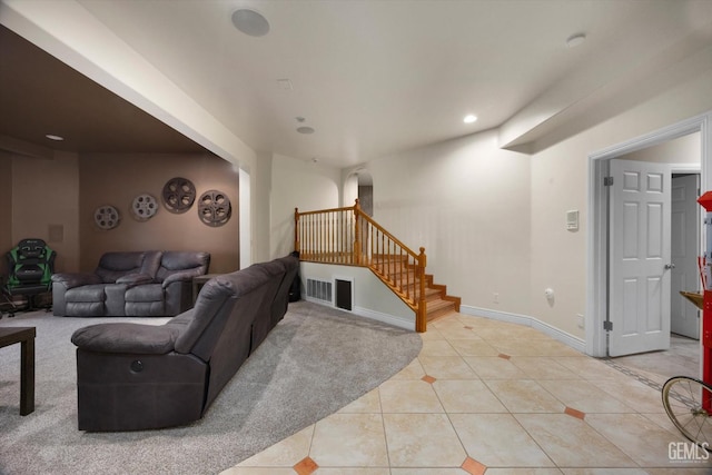 214 Driver Rd, Bakersfield, CA 93314 - living area with light tile patterned floors, stairway, recessed lighting, baseboards, and arched walkways