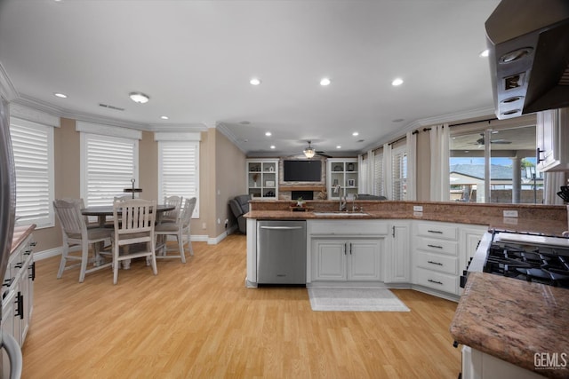 214 Driver Rd, Bakersfield, CA 93314 - kitchen featuring stainless steel dishwasher, ornamental molding, baseboards, light wood-style floors, and recessed lighting
