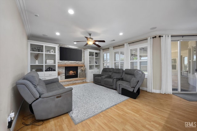 214 Driver Rd, Bakersfield, CA 93314 - living area with ornamental molding, a ceiling fan, wood finished floors, recessed lighting, and a fireplace