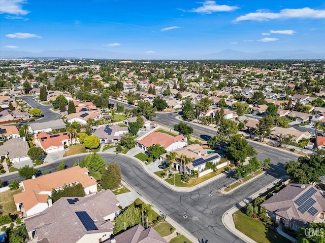 birds eye view of property with a residential view