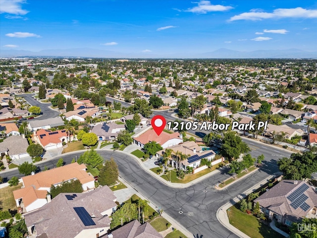 aerial view with a mountain view and a residential view