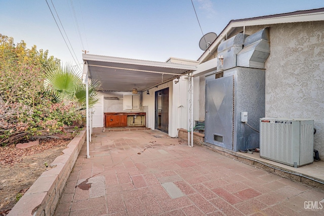 view of patio featuring central air condition unit