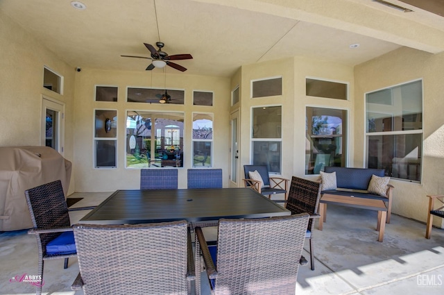 view of patio featuring ceiling fan, an outdoor living space, and area for grilling