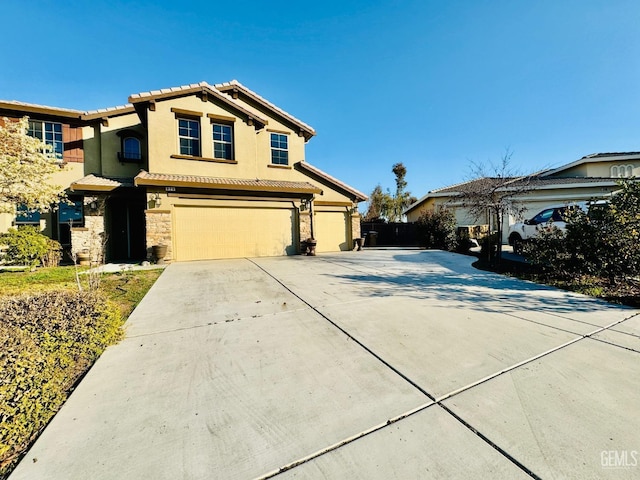 view of front of home with a garage