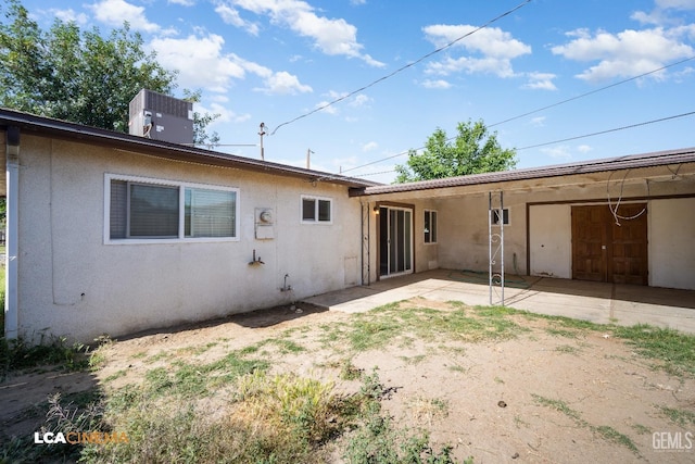 2620 Connie Ave, Bakersfield, CA 93304 - back of house with stucco siding and a patio area
