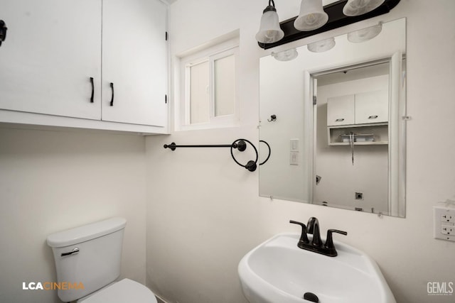 2620 Connie Ave, Bakersfield, CA 93304 - half bath featuring a sink and toilet