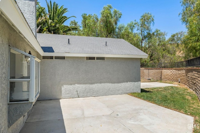 view of patio / terrace with fence