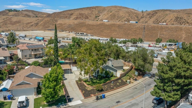 bird's eye view featuring a residential view and a mountain view