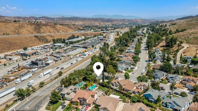 bird's eye view featuring a residential view and a mountain view