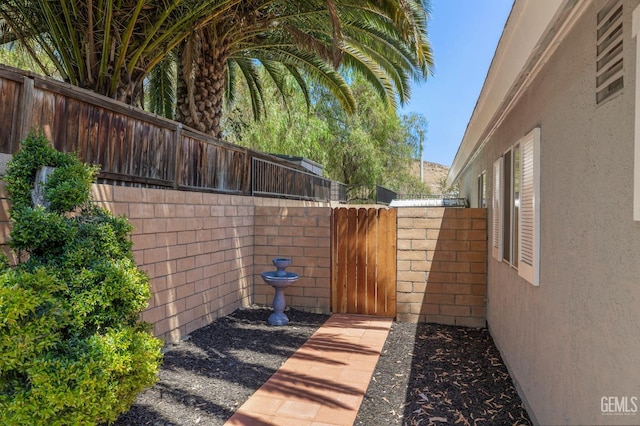 exterior space with a fenced backyard