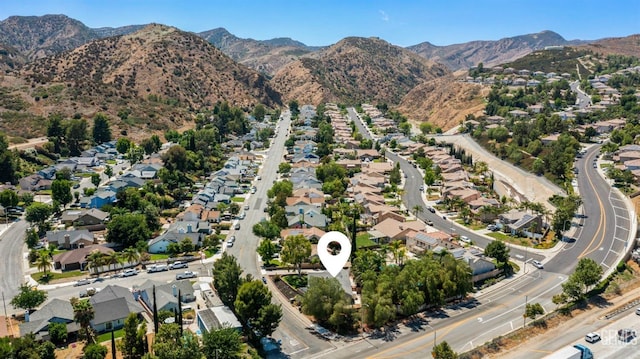 bird's eye view with a residential view and a mountain view