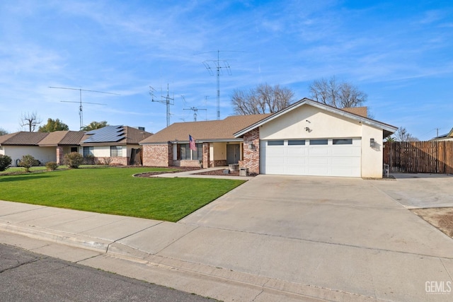 ranch-style house featuring a garage, brick siding, fence, driveway, and a front lawn