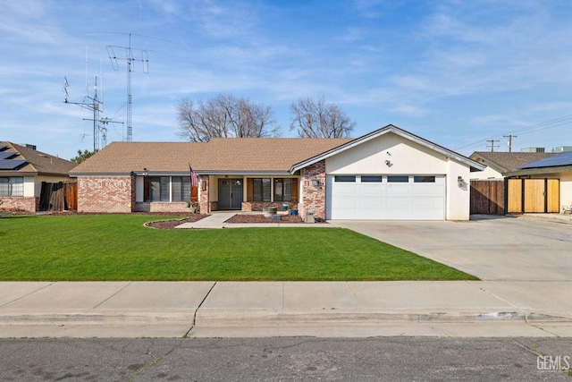 single story home with a front yard, brick siding, driveway, and an attached garage