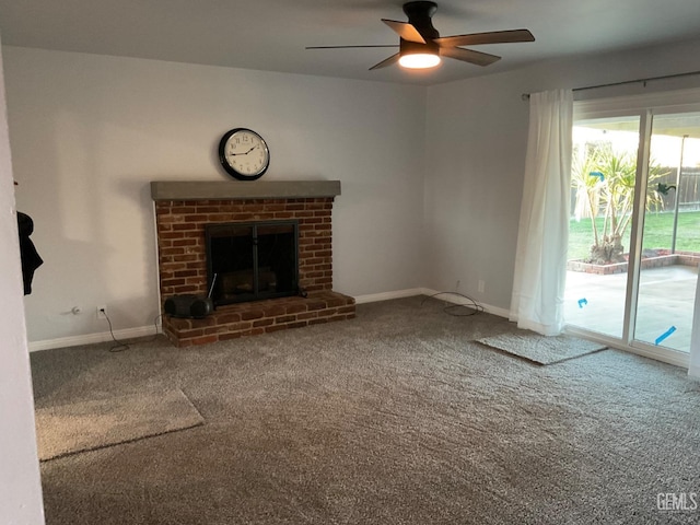 unfurnished living room featuring ceiling fan, carpet flooring, and a fireplace