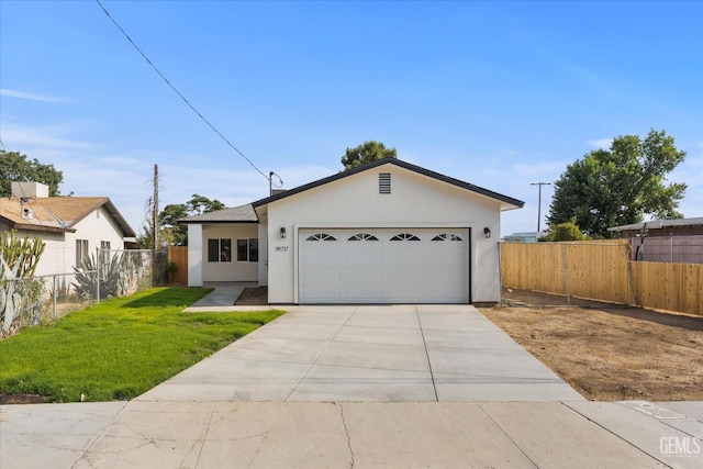30717 Paseo De Pico, Shafter, CA 93263 - view of front of home with stucco siding, concrete driveway, and an attached garage