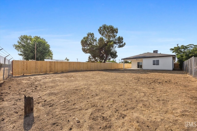 30717 Paseo De Pico, Shafter, CA 93263 - fenced backyard with a patio
