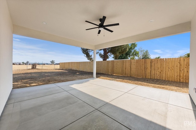 30717 Paseo De Pico, Shafter, CA 93263 - fenced backyard with ceiling fan and a patio area