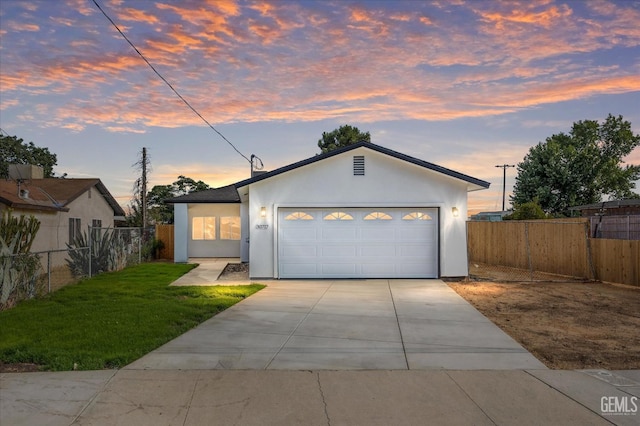 30717 Paseo De Pico, Shafter, CA 93263 - view of front facade with stucco siding, driveway, and a garage