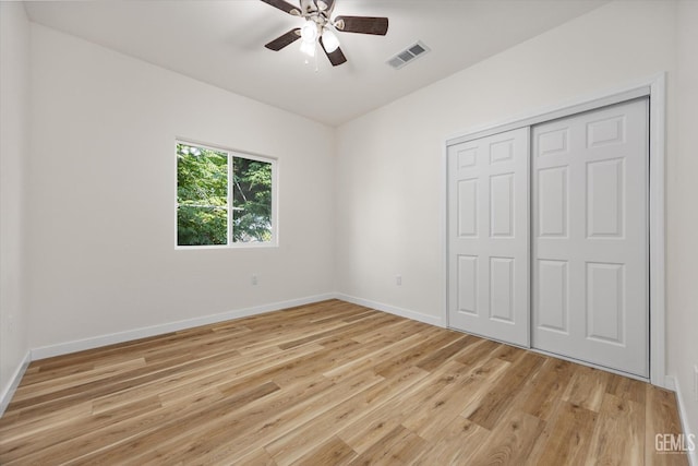 30717 Paseo De Pico, Shafter, CA 93263 - unfurnished bedroom with light wood-style floors, a closet, and ceiling fan