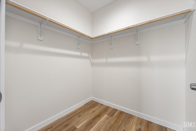 30717 Paseo De Pico, Shafter, CA 93263 - spacious closet featuring wood finished floors