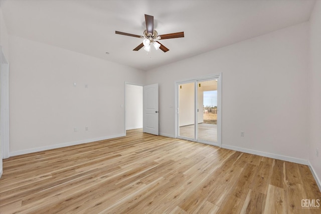 30717 Paseo De Pico, Shafter, CA 93263 - unfurnished bedroom with light wood-style flooring, ceiling fan, and access to exterior