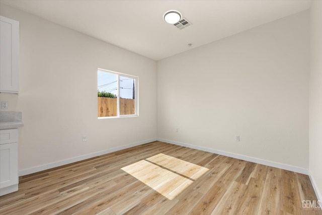 30717 Paseo De Pico, Shafter, CA 93263 - empty room featuring baseboards and light wood-type flooring