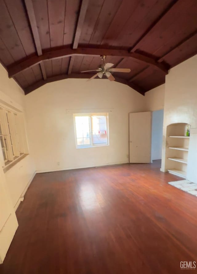 unfurnished living room with ceiling fan, vaulted ceiling with beams, dark hardwood / wood-style floors, and wood ceiling