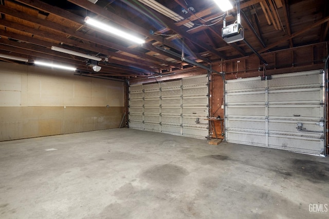 garage featuring a garage door opener