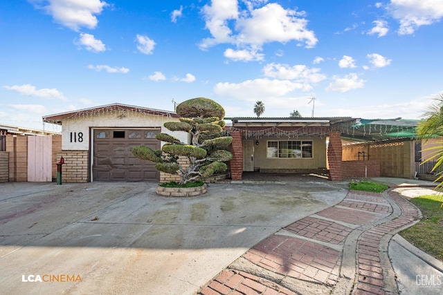 view of front of property with a garage