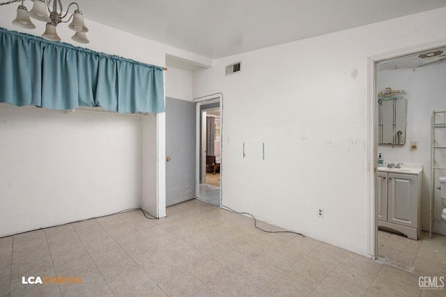 unfurnished bedroom with sink