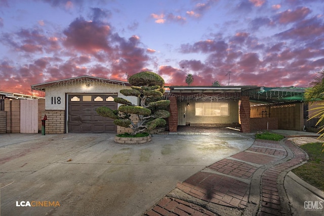 view of front of property with a garage